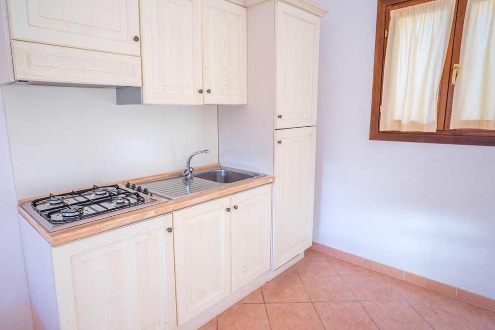 Residence Baia Sant Anna Con Piscina ตาเนาเนลลา ภายนอก รูปภาพ