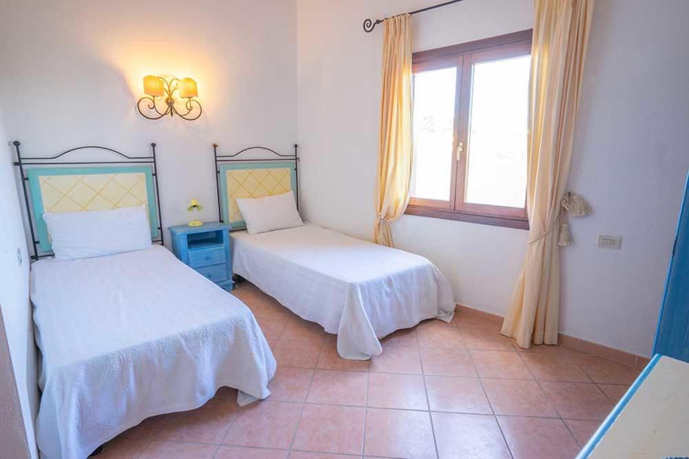 Residence Baia Sant Anna Con Piscina ตาเนาเนลลา ภายนอก รูปภาพ