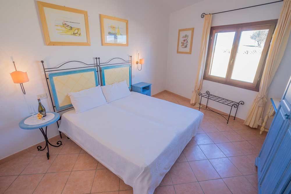 Residence Baia Sant Anna Con Piscina ตาเนาเนลลา ภายนอก รูปภาพ