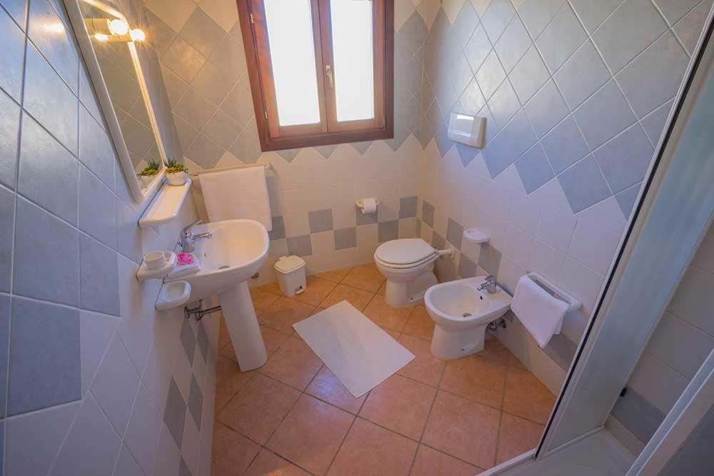 Residence Baia Sant Anna Con Piscina ตาเนาเนลลา ภายนอก รูปภาพ